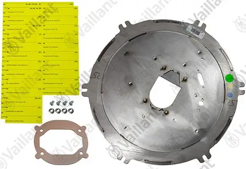 Vaillant Abdeckung für Brennkammer, metallene Scheibe mit mehreren Löchern, dazu Dichtungsring und Schrauben, die auf gelbem Kartenmaterial angeordnet sind.